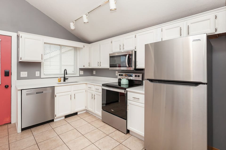 All new stainless steel appliances and quartz marble looking counters. 