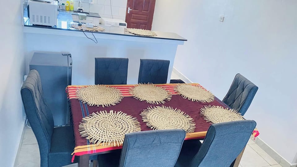 Strong hardwood dining table with very comfortable chairs 