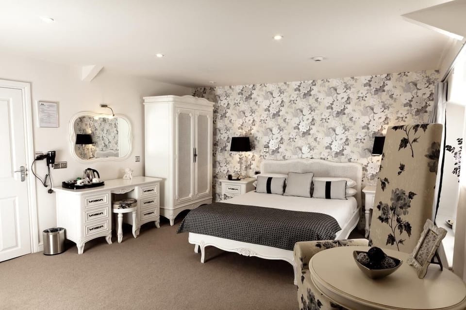 Suite | Individually decorated, individually furnished, desk, laptop workspace