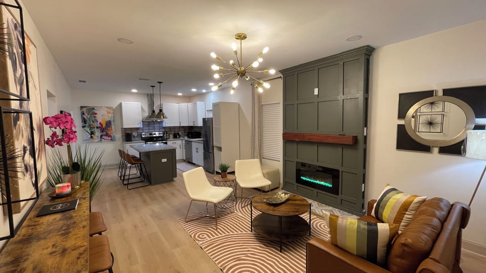 Open row house design: living space and kitchen