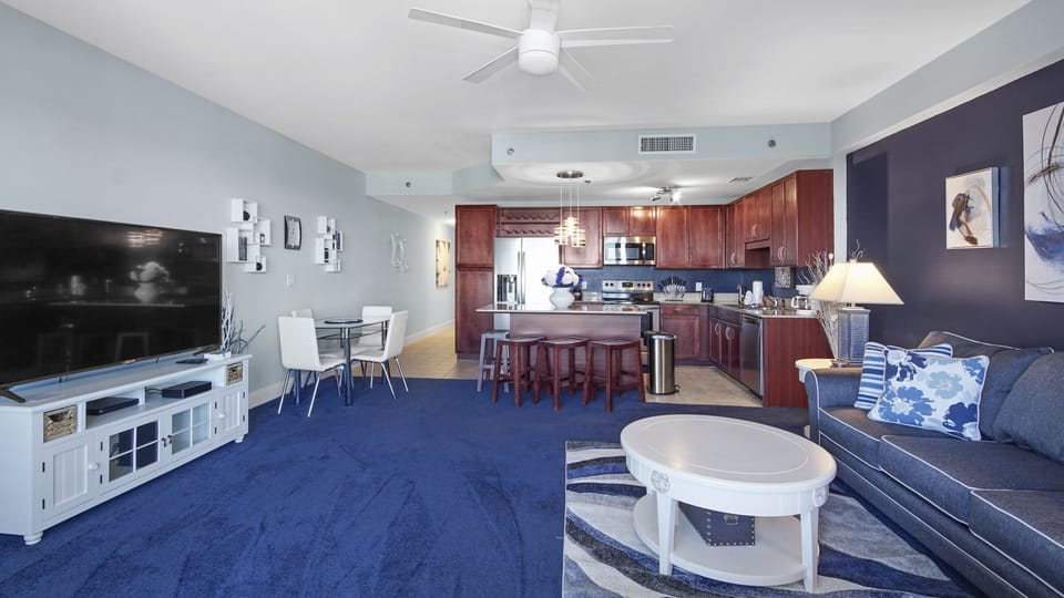 Open-concept living area with a modern kitchen and dining space.