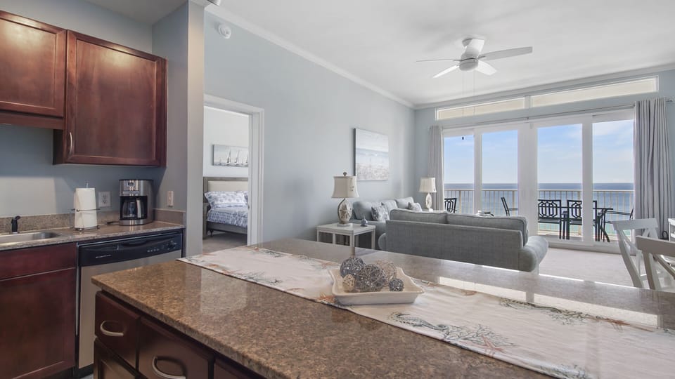Relax in this modern living area with ocean views and natural light.