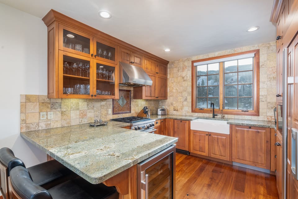 Kitchen - Open concept with granite countertops and ample prep space