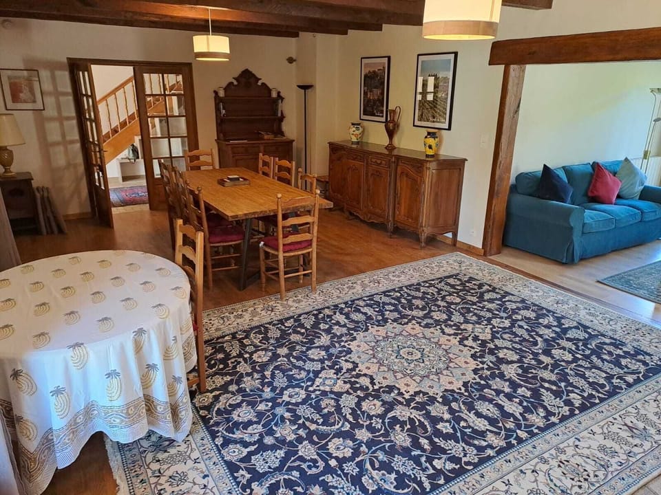 Dining area leading through to entrance hall.