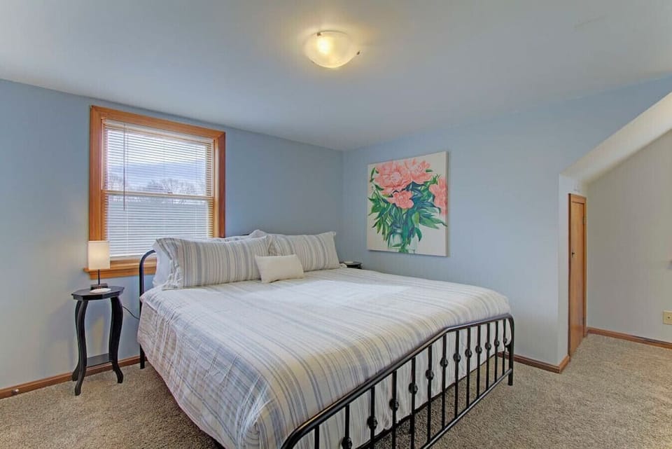 Peaceful King Bedroom with Natural Light and Closet Space