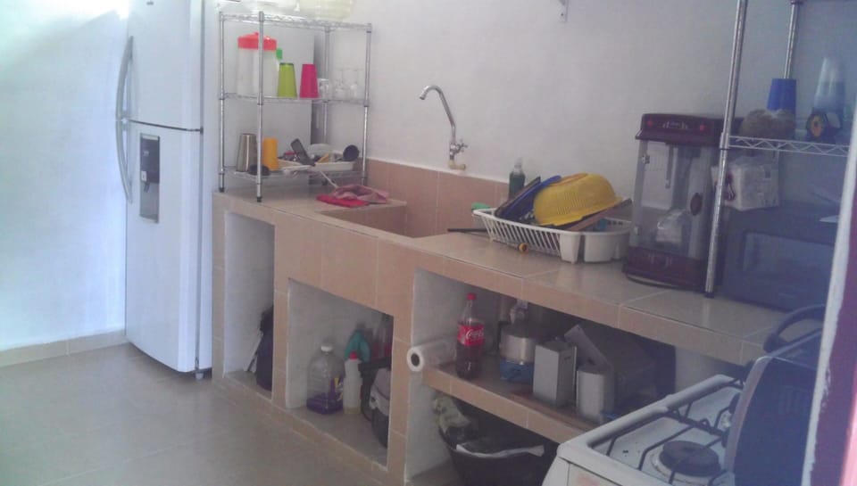 Full-size fridge, oven, stovetop, blender