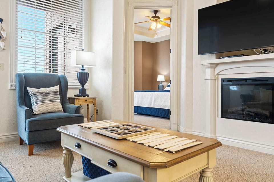 Condo, Multiple Beds, Balcony, Mountain View (Cliffside Lake Retreat ) | Living area | 42-inch flat-screen TV with digital channels, fireplace