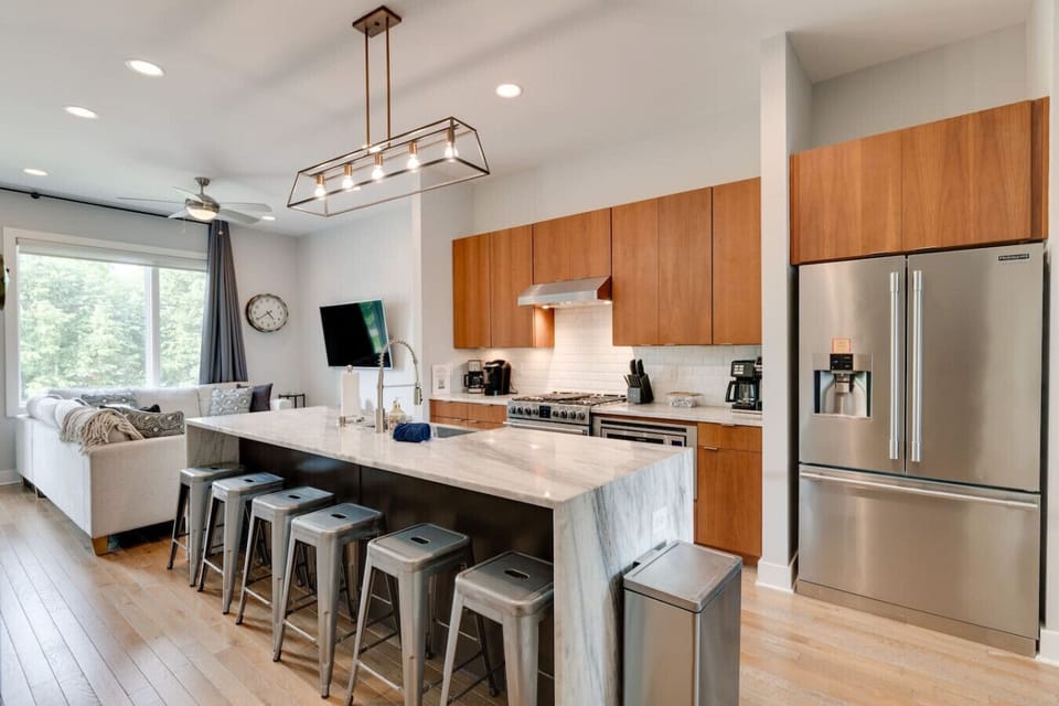 Spacious kitchen with an island that seats six perfect for social meals and gatherings