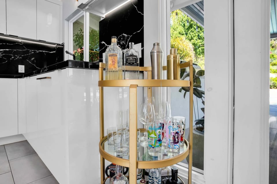 Store your favorite spirits in style with our stunning Barcart! This chic piece not only showcases your barware beautifully but also transforms any corner into a vibrant gathering spot. Raise a glass and let the good times flow! 