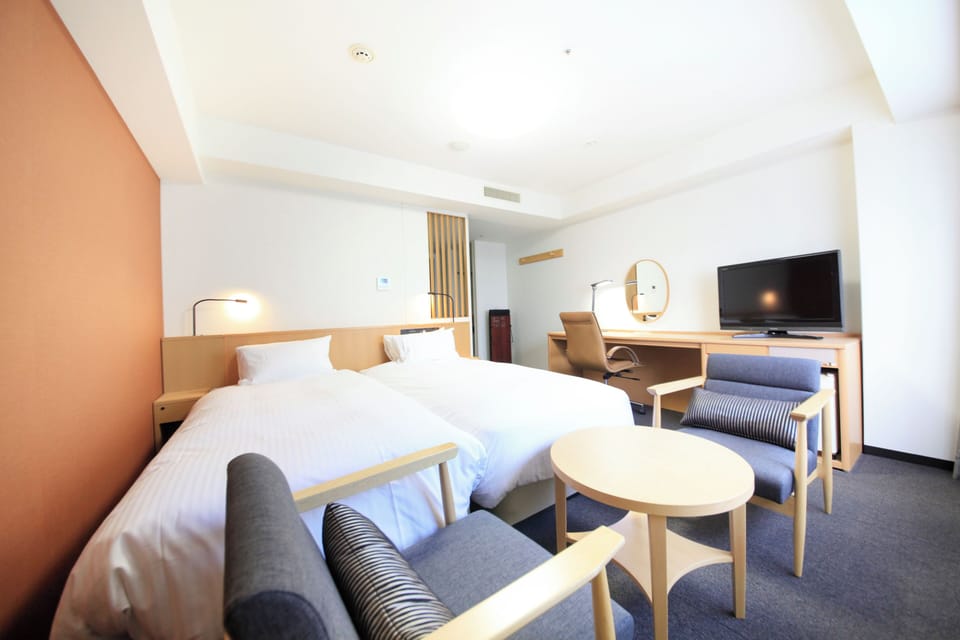 Desk, laptop workspace, free WiFi, bed sheets