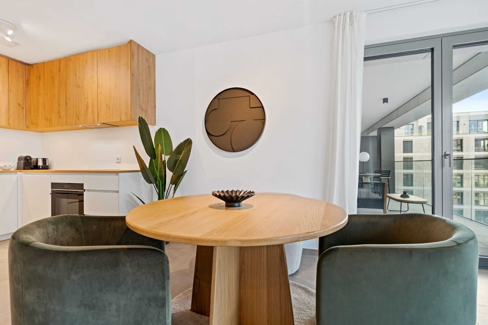 Savor a meal or a moment of reflection at our chic, round dining table.