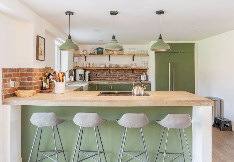 Open concept kitchen with island seating for 4