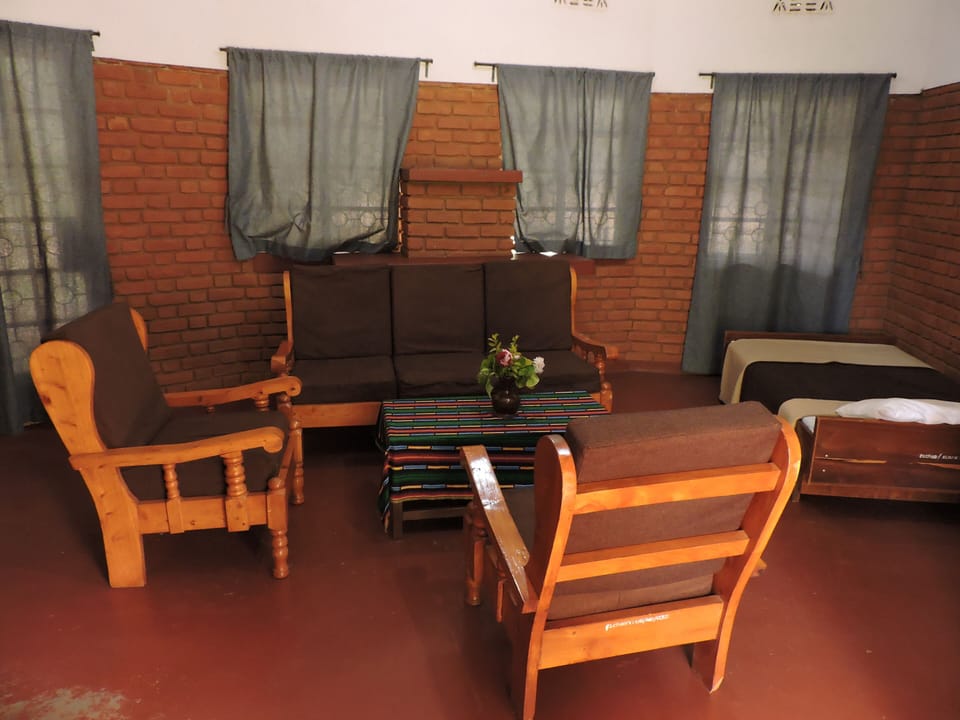 Basic Double Room | Living area | TV, fireplace