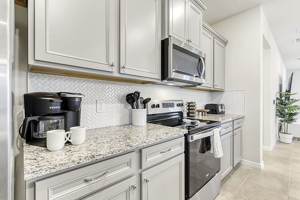Modern Full Size Kitchen with Bar Stool Seating