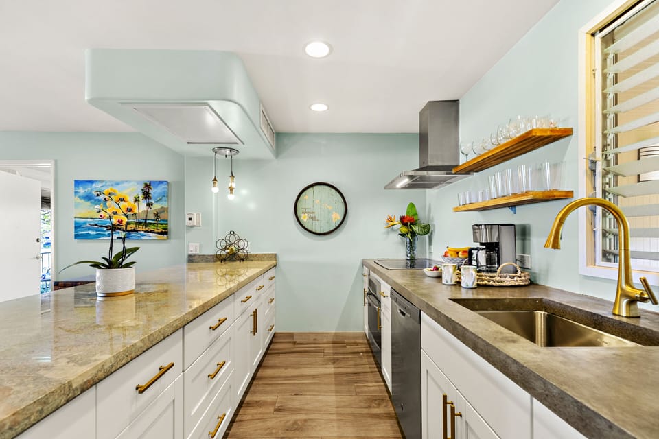 Gourmet Galley Kitchen - Stylish galley kitchen with granite countertops, open shelving, modern fixtures, and premium appliances for effortless meal prep.