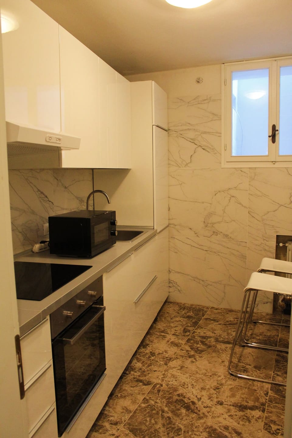 Family Apartment | Private kitchen | Highchair