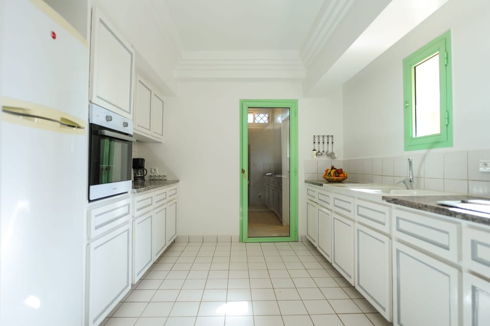 Exclusive Apartment, 3 Bedrooms | Private kitchen | Full-size fridge, microwave, oven, stovetop