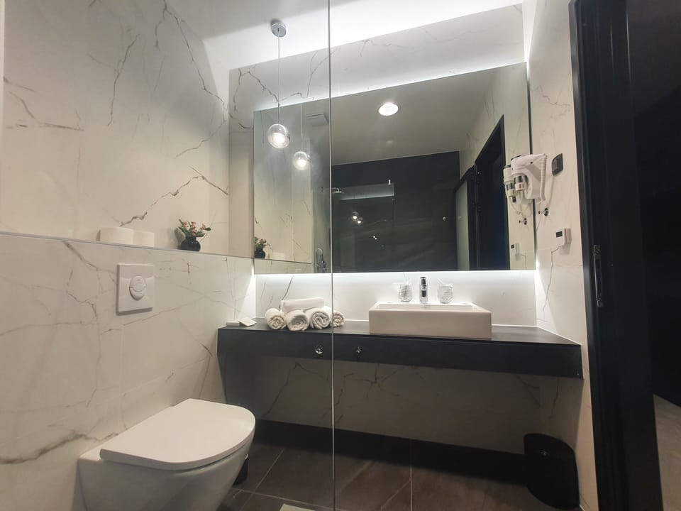 Free toiletries, hair dryer, slippers, heated floors
