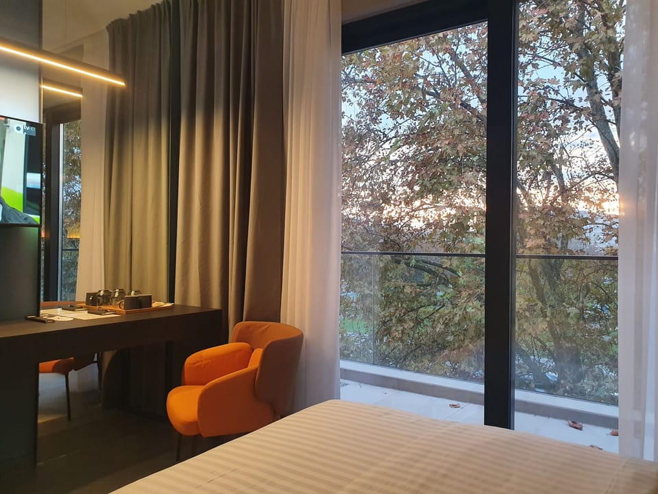 Premium bedding, down comforters, memory foam beds, free minibar