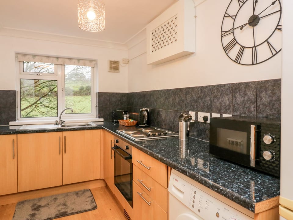 Fridge, electric kettle, toaster, cookware/dishes/utensils