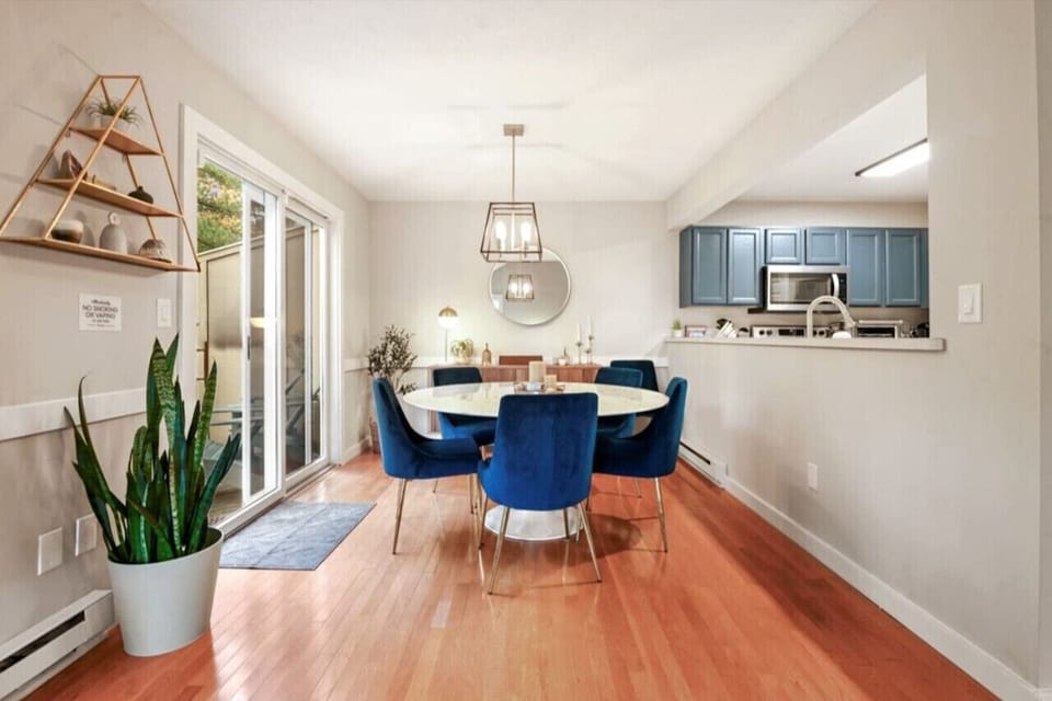 Seating for six in the dining room, where you can create the perfect ambiance with a dimmable chandelier.