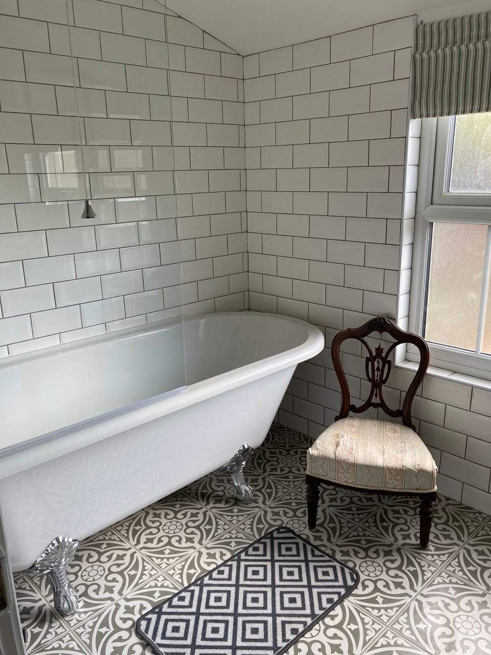 Main bathroom roll top bath and shower