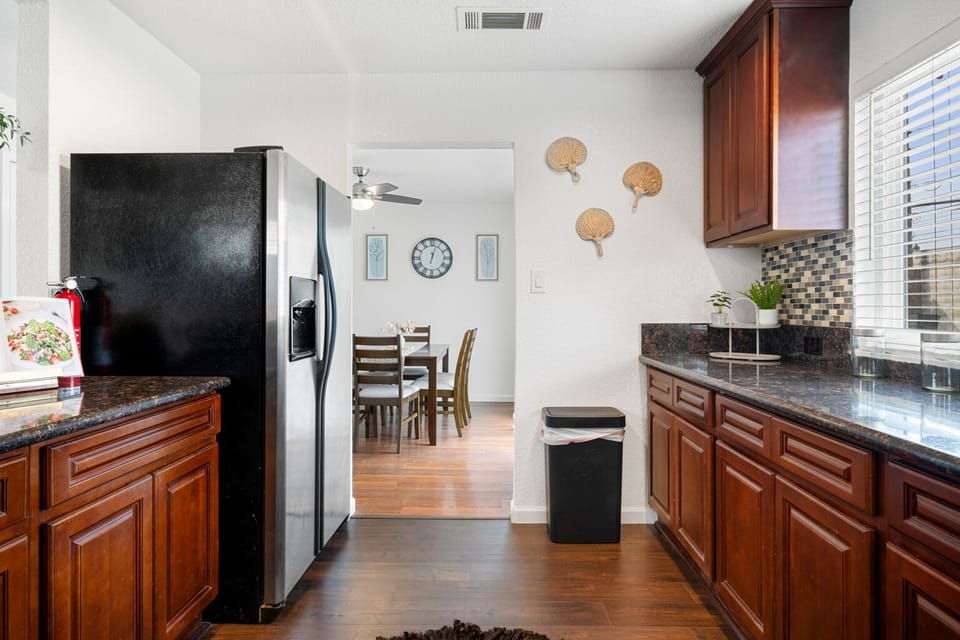 The fridge is huge and houses plenty of space for foods and goods.