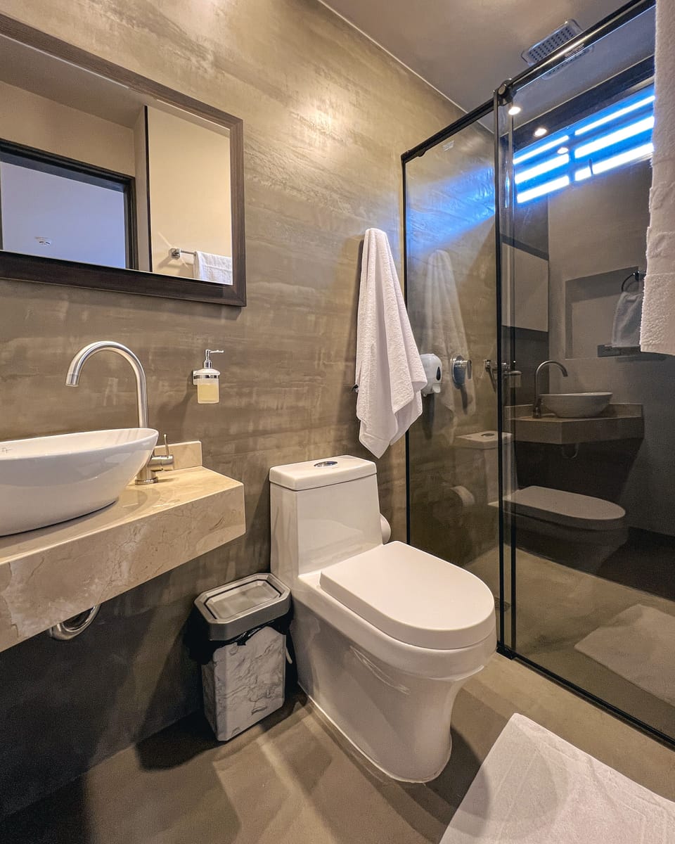 Superior Room, Multiple Beds | Bathroom | Shower, towels, soap, shampoo
