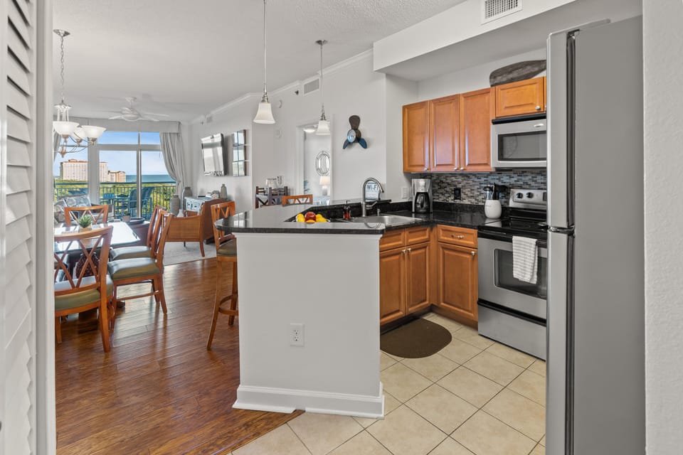 Enjoy a functional kitchen with modern appliances, ample storage, and comfort.