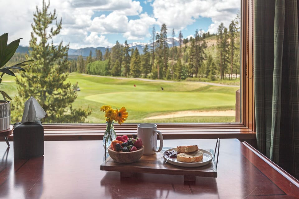 Best Seat in the House — The master desk view is pure Keystone magic—greens below, mountains beyond, peace everywhere. 🏔️✨