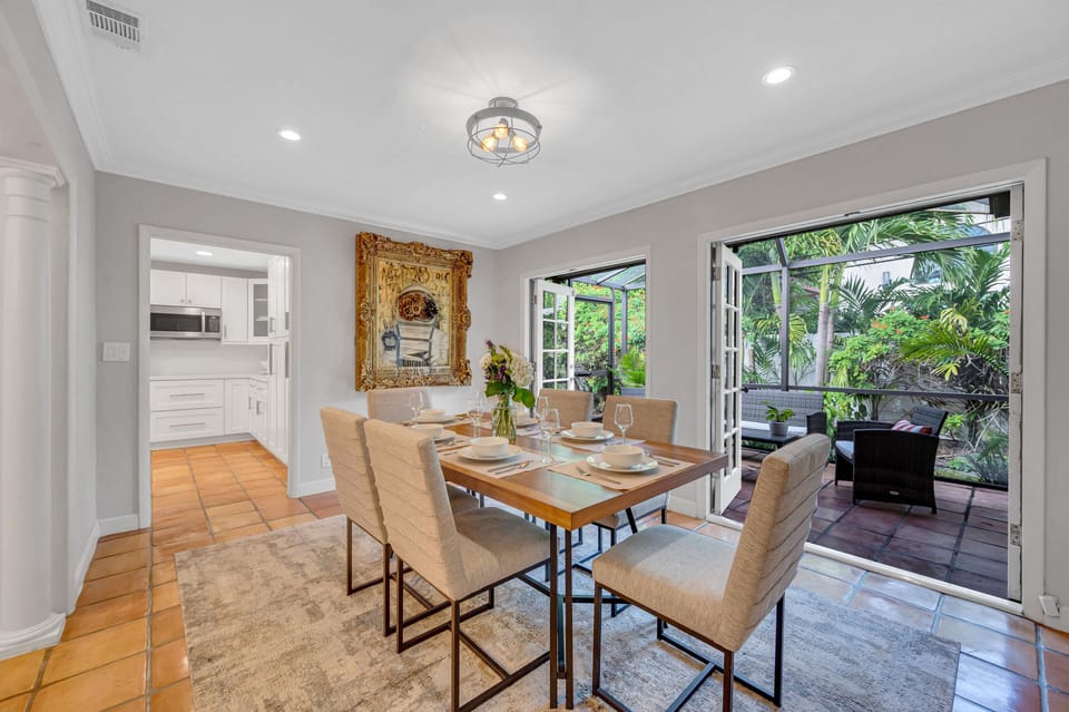 The dining room fit for six with access to one of the many outdoor patios.