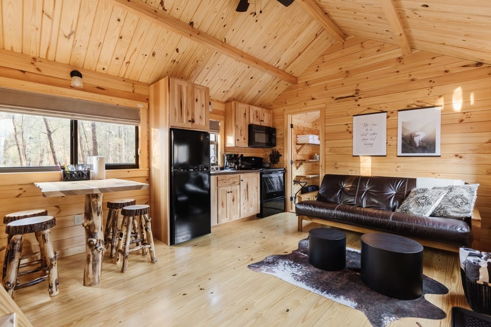The cabin is equipped with a full living room and a fully-equipped kitchen!