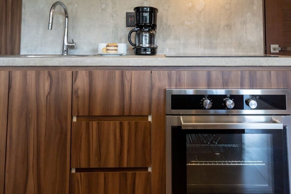 Craft delicious meals in your sleek, fully-equipped kitchen.