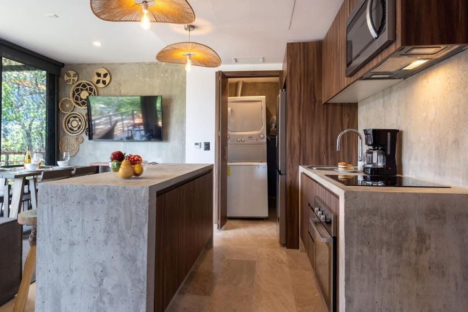 Culinary adventures await in this delightful open-concept kitchen.