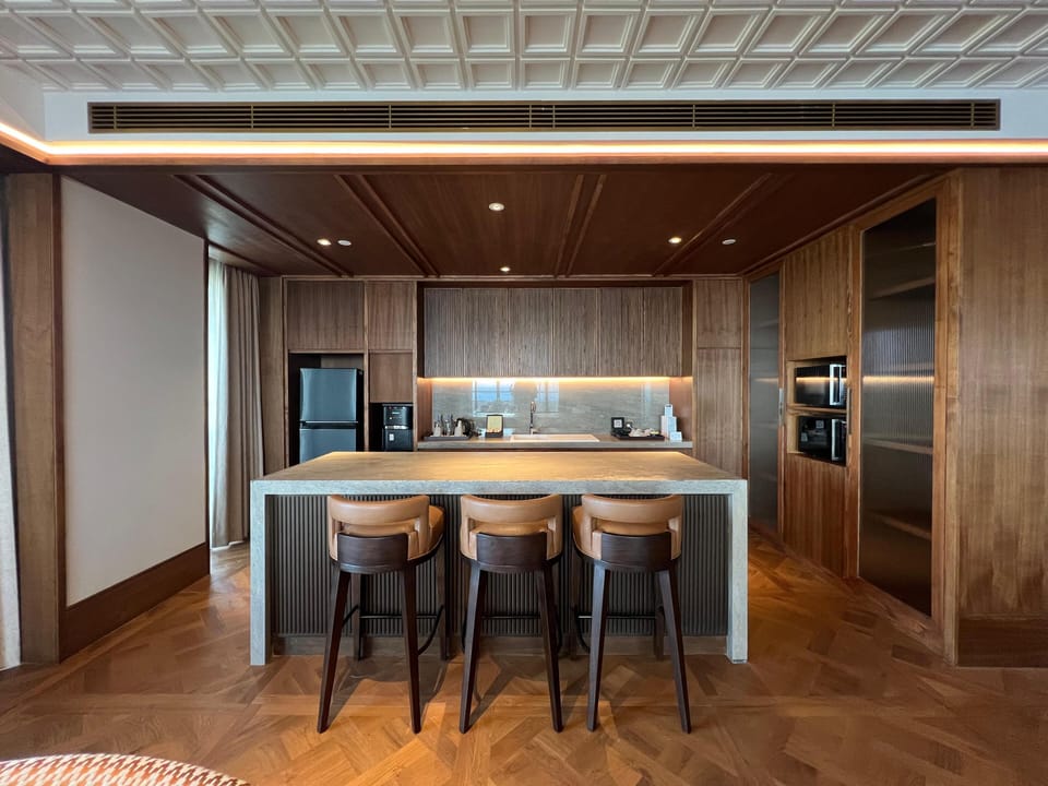 Presidential Suite Ocean View | Living area | 55-inch Smart TV with satellite channels