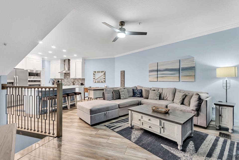 2nd Floor - 🛋️ Spacious Living Room – Cozy sofa, flat-screen TV, and balcony access