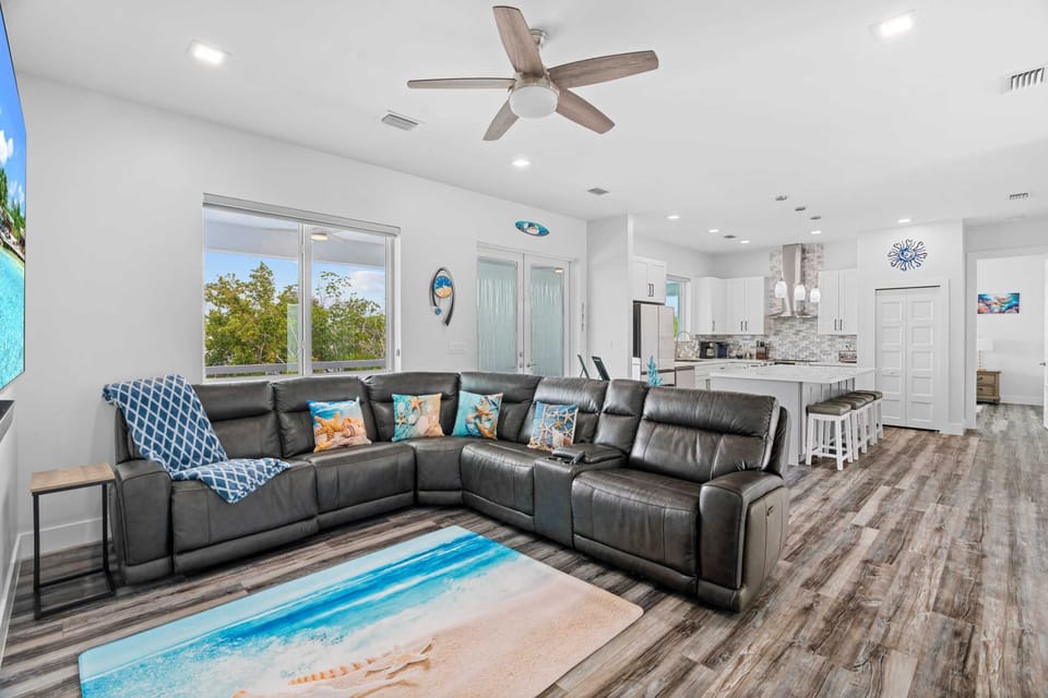 This modern and stylish living area is the perfect place to relax and unwind after exploring.
