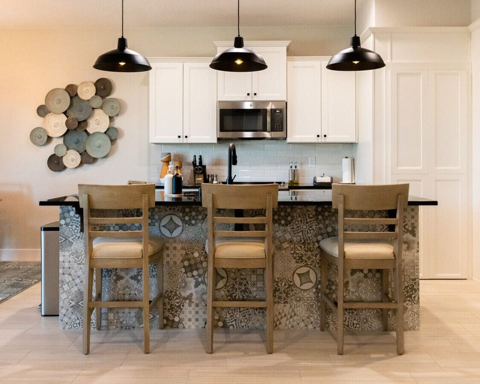 Stylish bar seating makes seating for 9.