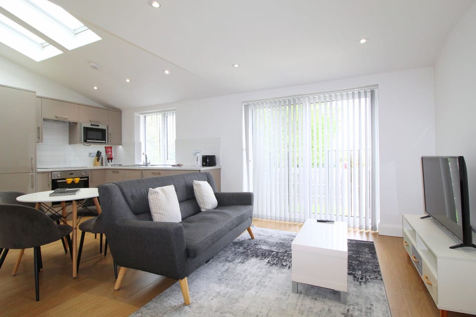 Apartment, 1 Bedroom | Living area | 42-inch Smart TV with cable channels, Netflix, streaming services