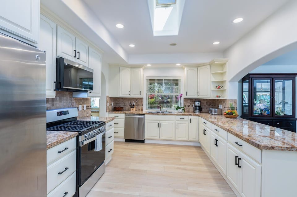 New gas stovetop, microwave, dishwasher and all new dishes and amenities!