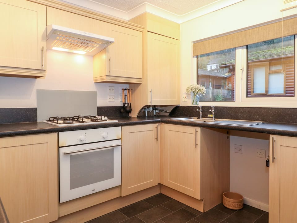 Fridge, electric kettle, toaster, cookware/dishes/utensils