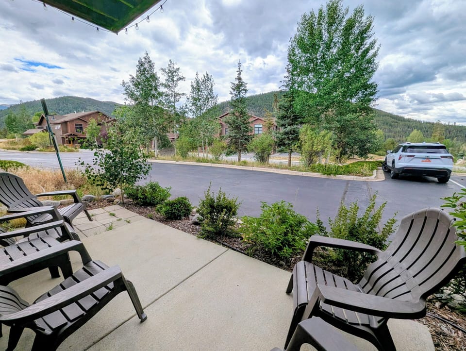 Scenic mountain retreat nestled among lush greenery and forest-covered slopes, offering peaceful access to natural surroundings and fresh alpine air.