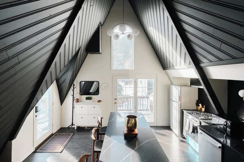 Entry with kitchen and island seating