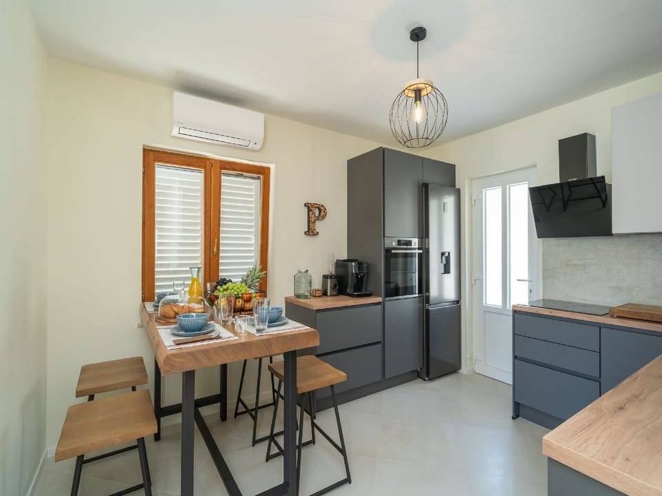 Villa (Three Bedroom Villa with Terrace) | Private kitchen | Fridge
