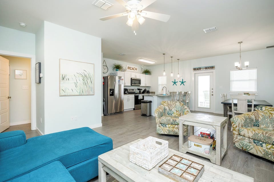 Relax in your bright, airy living space with coastal touches and modern comforts that invite you to unwind.