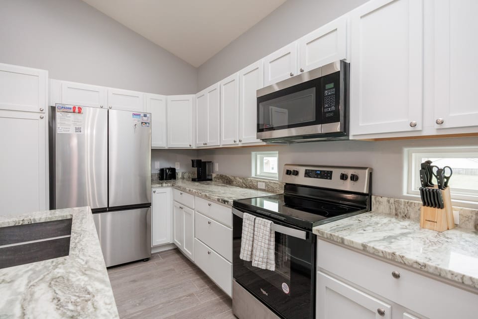 Your fully equipped kitchen features granite counters, stainless steel appliances, and everything you need to cook your favorite meals during your stay.