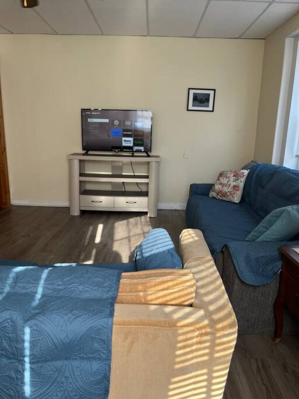 Relax, wind down, watch a movie or finish up the work day in this comfortable living area with a large TV and desk to meet your needs.