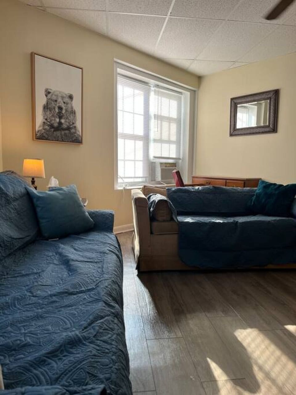 Relax, wind down, watch a movie or finish up the work day in this comfortable living area with a large TV and desk to meet your needs.