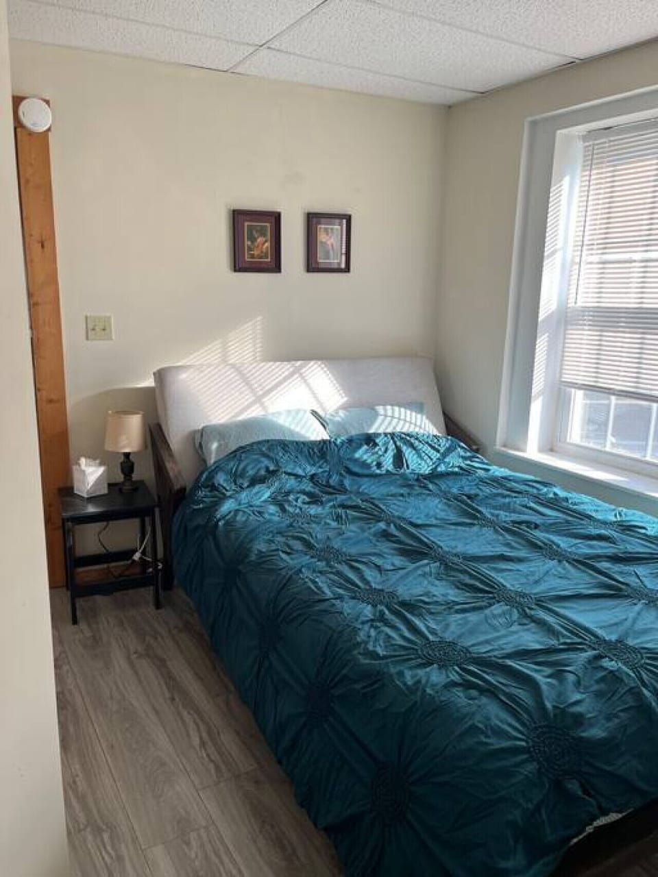 Rest comfortably in this queen bed.