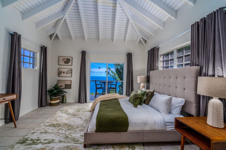 The spacious and beautiful master bedroom with king bed, ensuite bath, AC, flat screen TV, and private balcony!